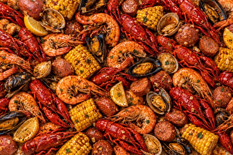 Seafood boil with crawfish, shrimp, mussels, clams, corn and sausage